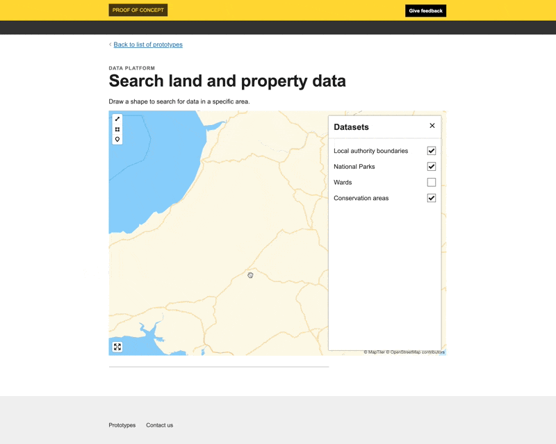 A screen capture of the search land and property data by area prototype. It shows a user drawing an area. After the user draws a shape, a boundaing box is displayed around it. Then data from the platform is show within this box.